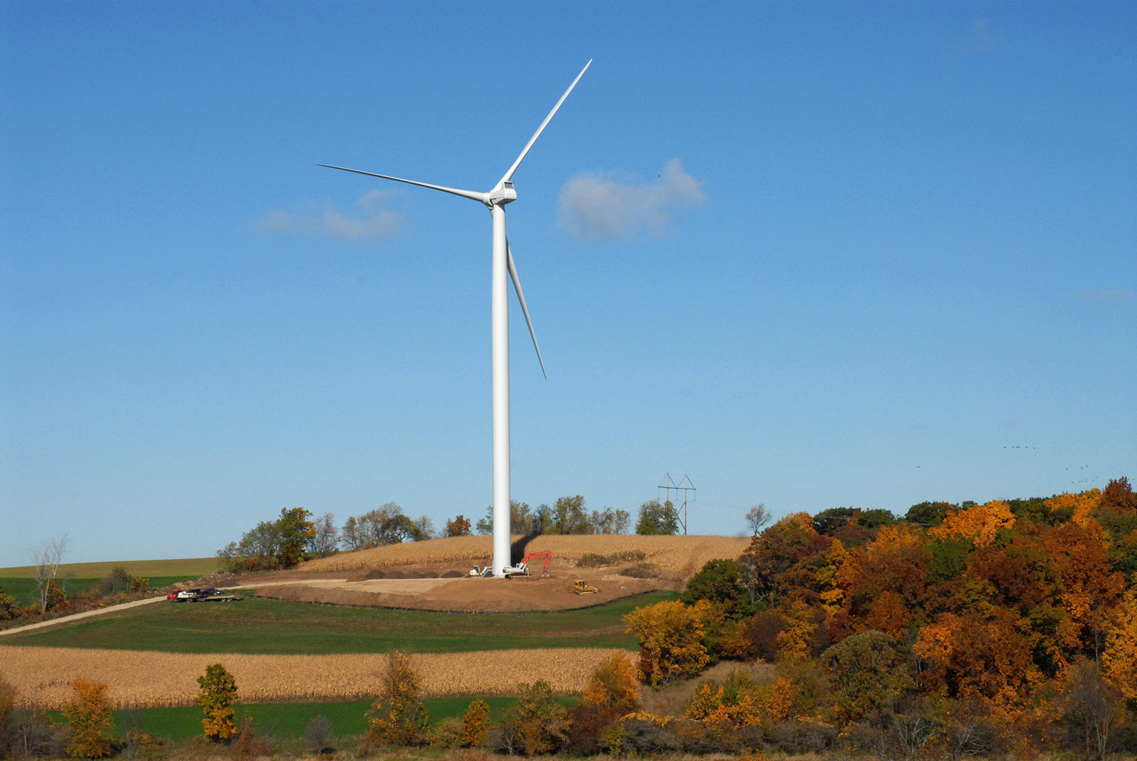 A wind turbine in a farm field