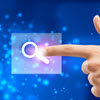 finger pressing search icon
