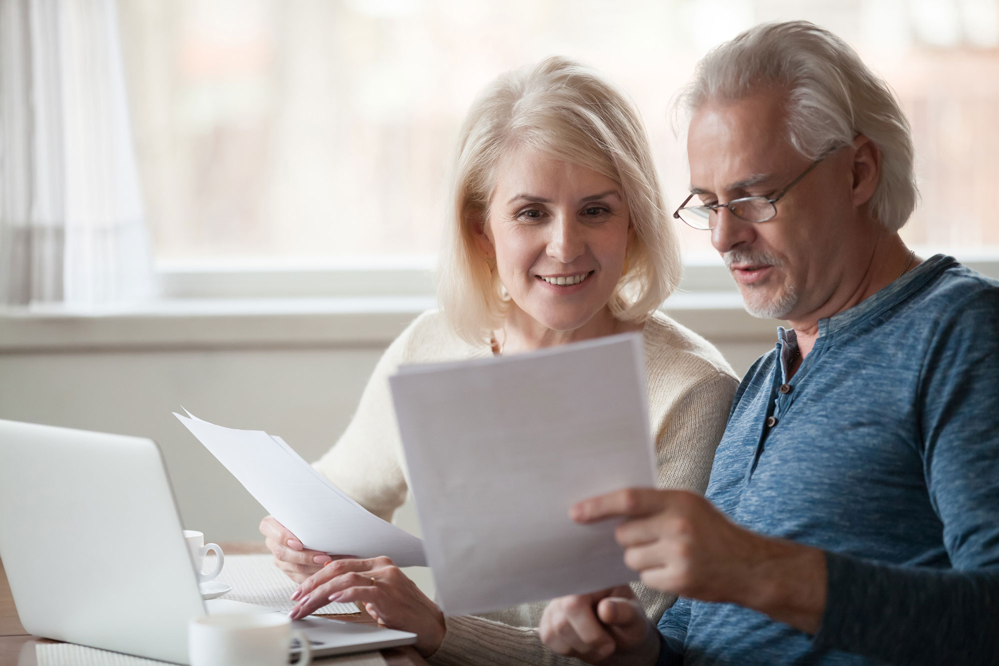 Couple looking at a bill